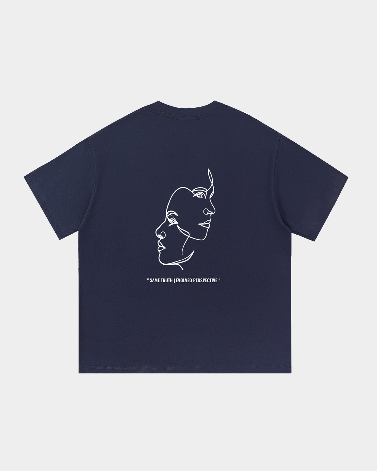Luna Soul Navy Unisex Same Truth Tee, 260gsm heavyweight with a minimal front view, featuring an art design of two faces intertwining in white Same Truth Evolved Perspective quote print. Made from cotton fabric, and perfect for streetwear. Close-up detail of high crew neckline and premium mid-weight navy cotton fabric.