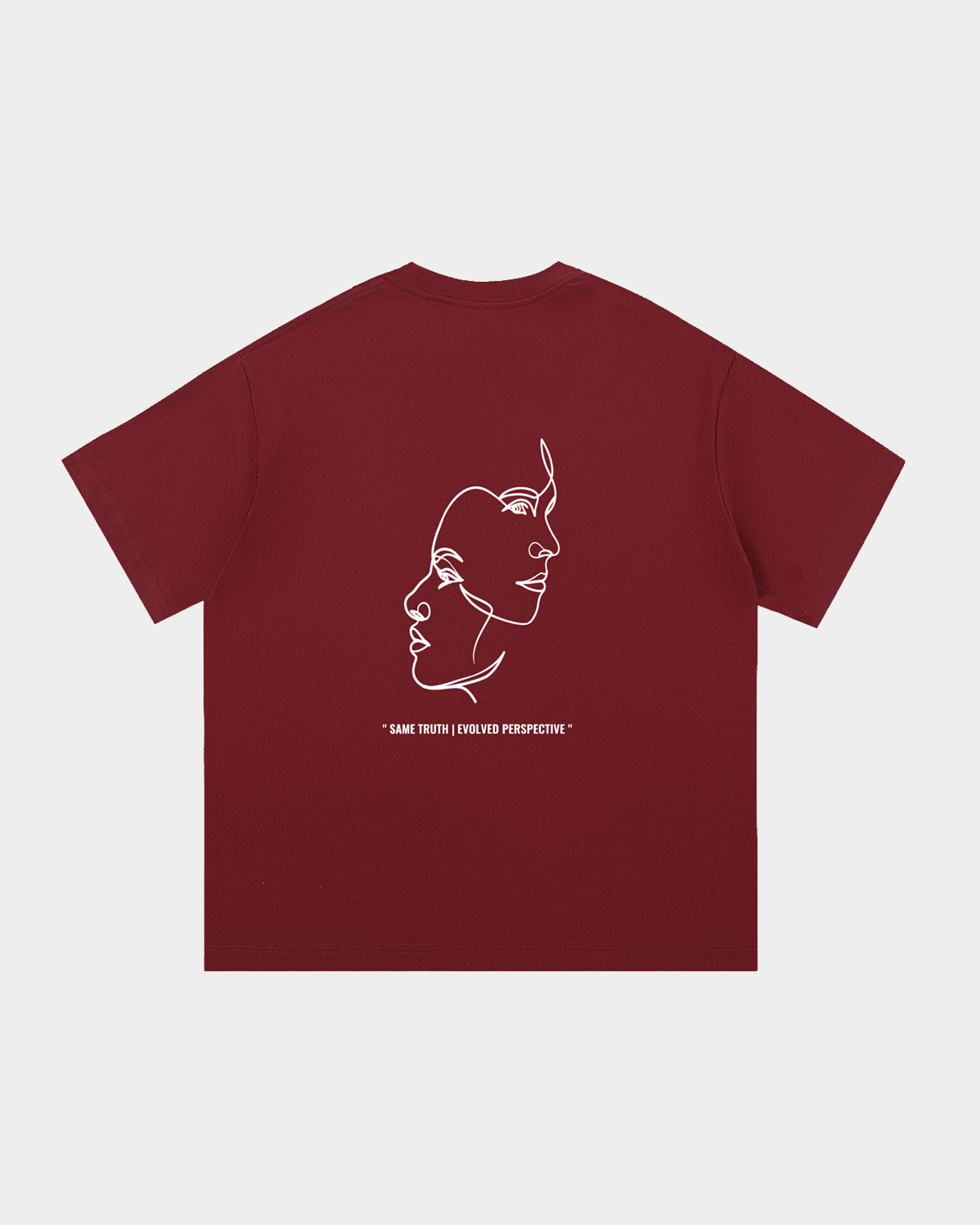 Luna Soul Red Unisex Same Truth Tee, 260gsm heavyweight with a minimal front view, featuring an art design of two faces intertwining in white Same Truth Evolved Perspective quote print. Made from cotton fabric, and perfect for streetwear. Close-up detail of high crew neckline and premium mid-weight red cotton fabric.