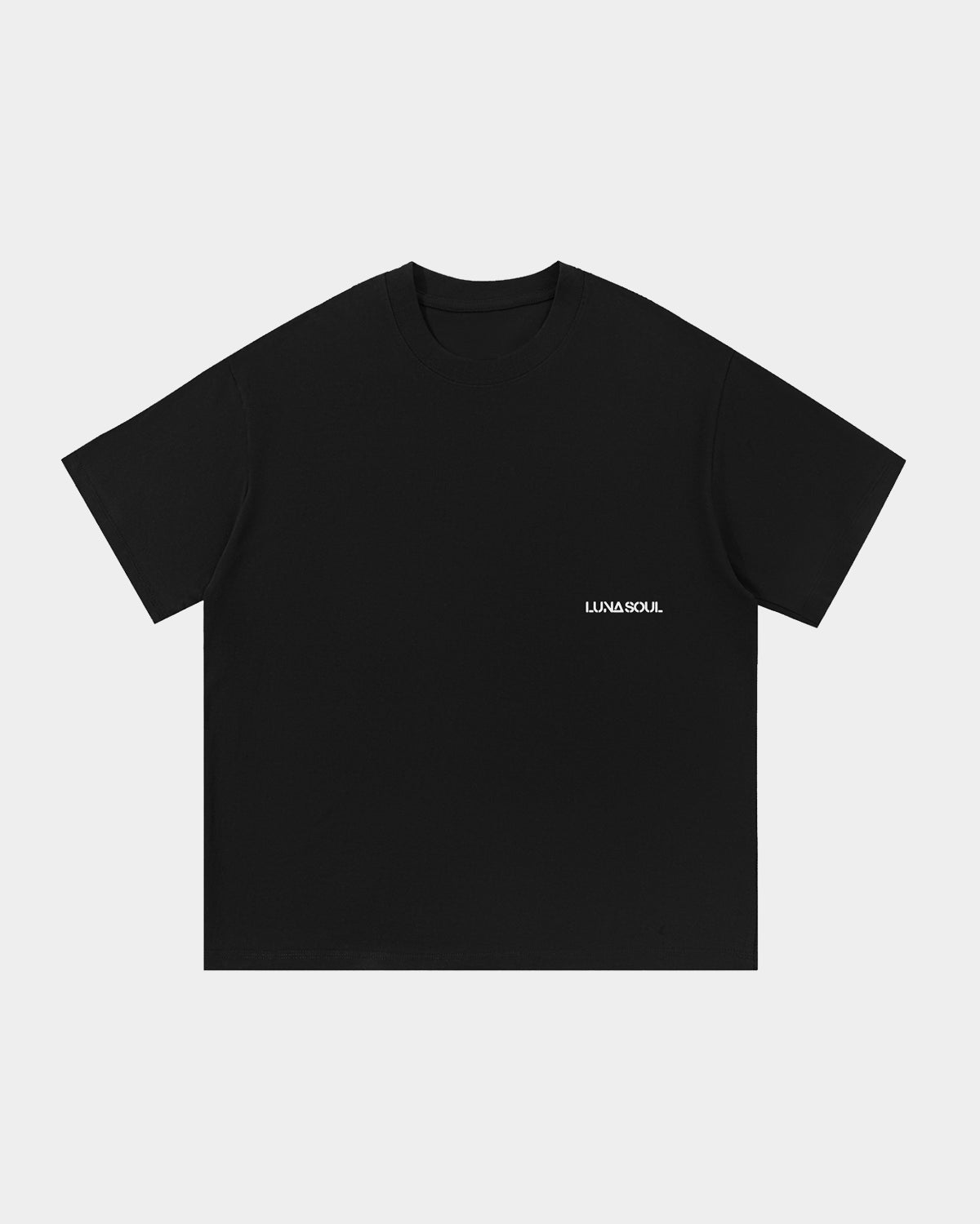 Luna Soul Black Unisex Same Truth Tee, 260gsm heavyweight with a minimal front view, featuring a small white logo on the background, made from cotton fabric, and perfect for streetwear. Close-up detail of high crew neckline and premium cotton fabric.