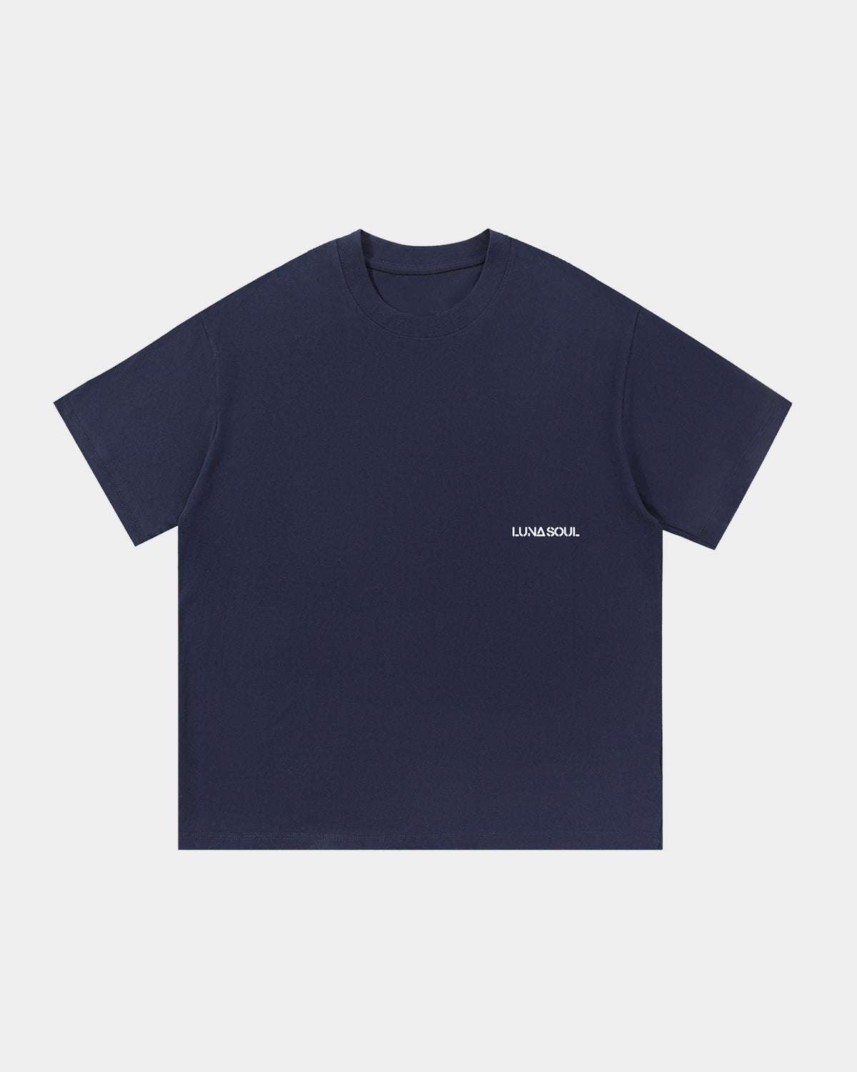 Luna Soul Navy Unisex Same Truth Tee, 260gsm heavyweight with a minimal front view, featuring a small white logo on the background, made from cotton fabric, and perfect for streetwear. Close-up detail of high crew neckline and premium cotton fabric.